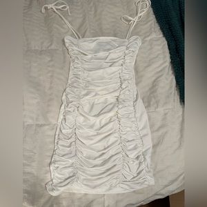 White ruffled bodycon dress